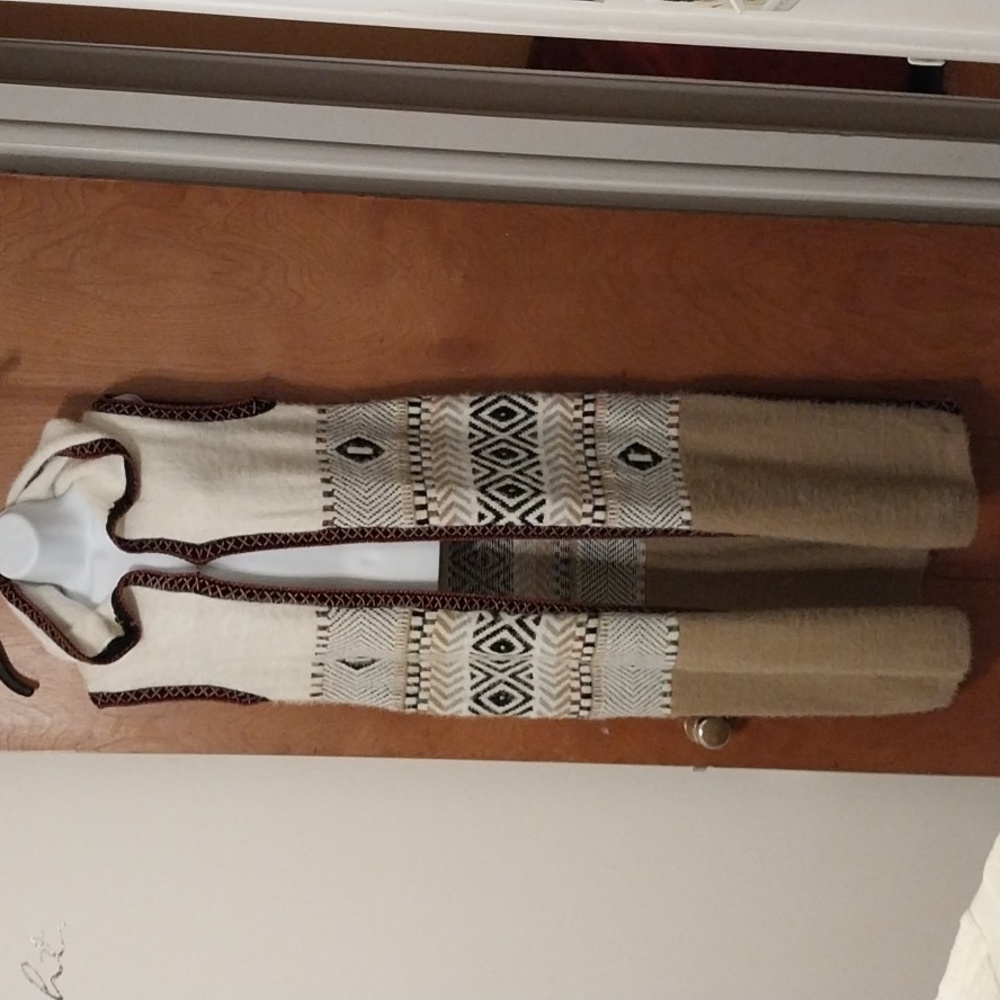 Sleeveless sweater coat - Picture 1 of 7